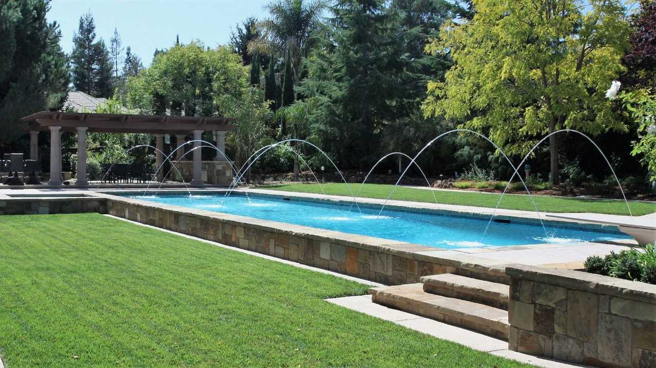 saratoga ranch pool stone wall lawn design build