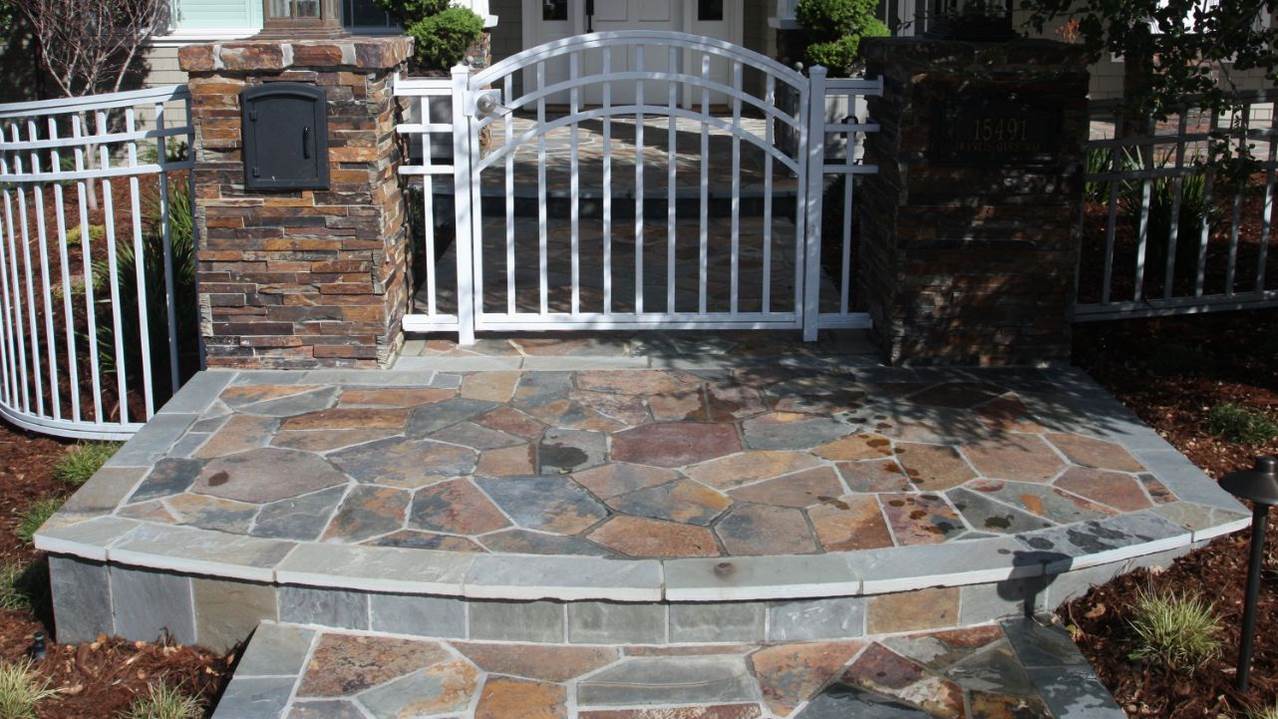 stone landing steps with custom gate and home entryway los gatos